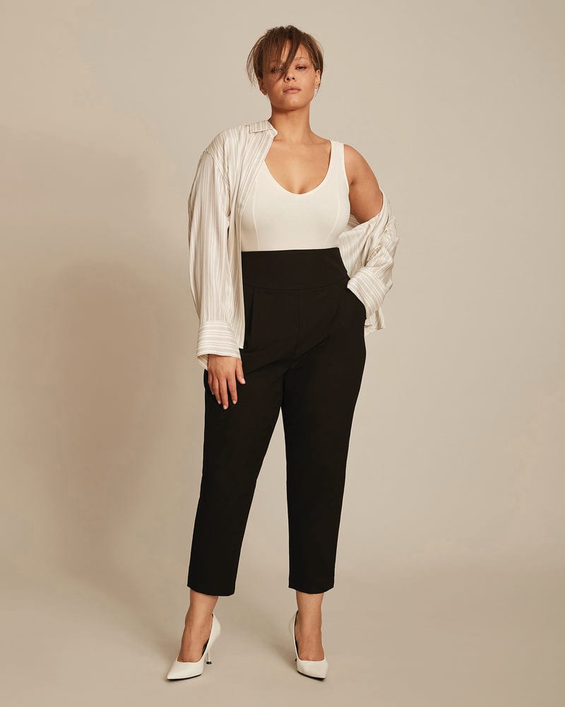 Front of a model wearing a plus size Parker Trouser in Black by 11 Honoré Collection. | dia_product_style_image_id:231323